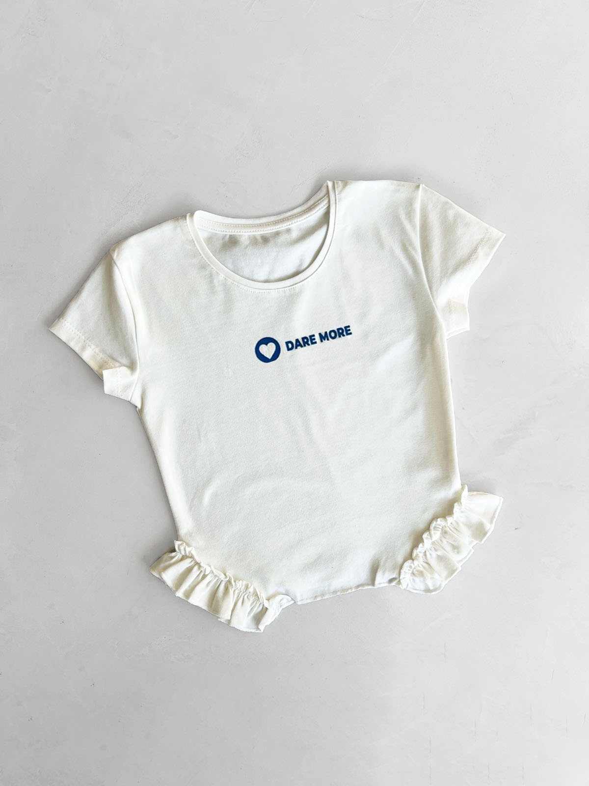 Art. 9036 remera baby tee frunce Dare More